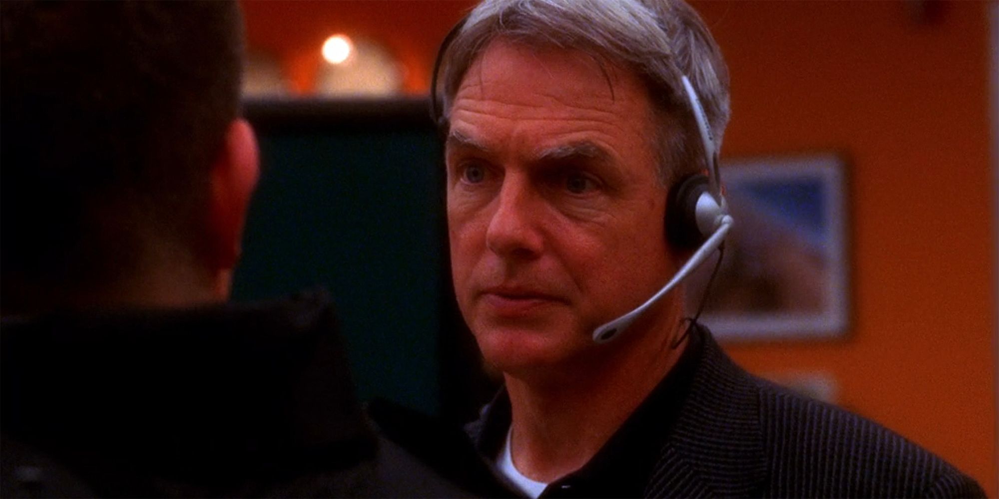 Gibbs wearing a headset for a hostage situation in NCIS