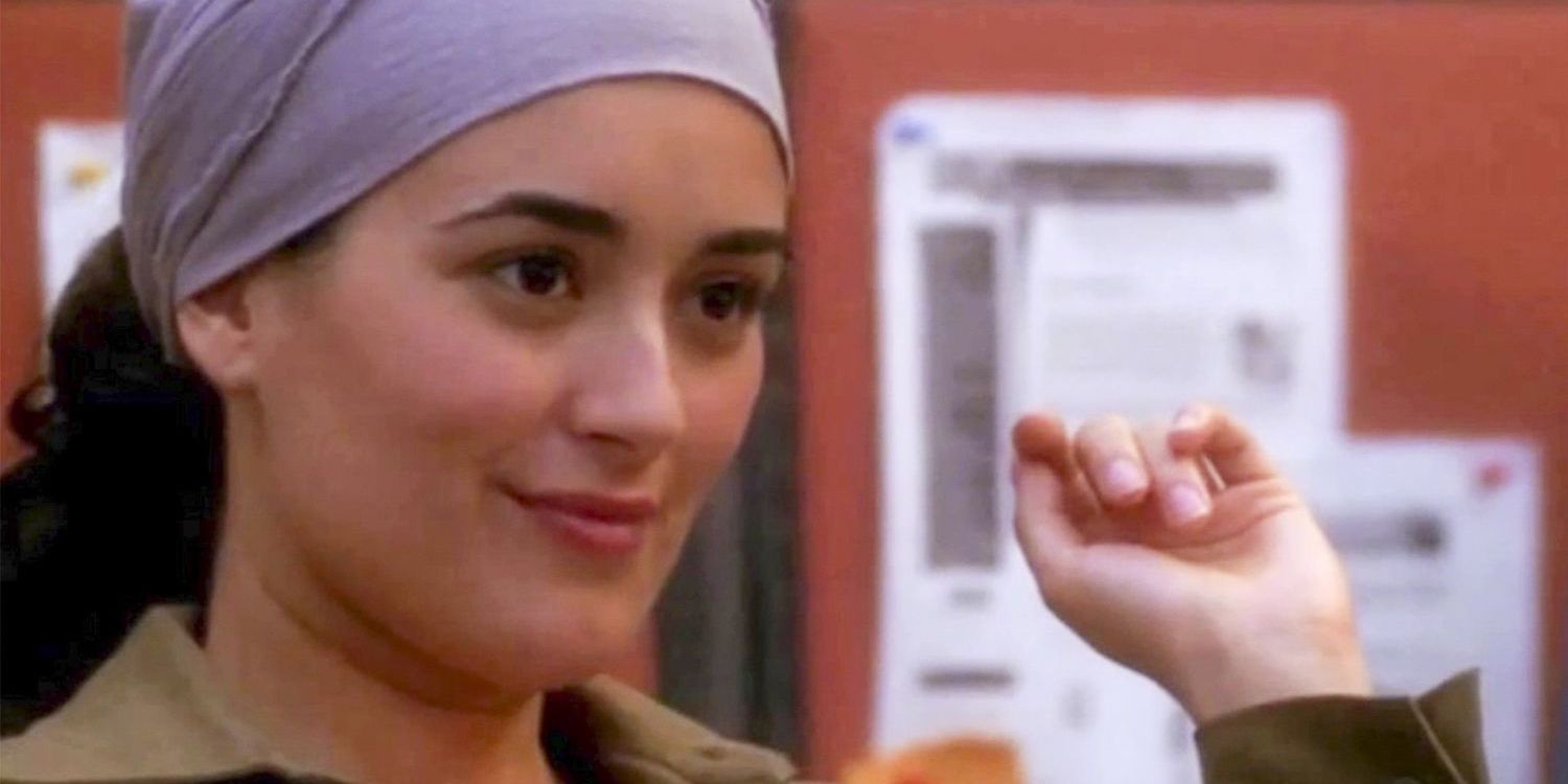 Cote de Pablo as Ziva David sitting at the office in NCIS episode Kill Ari