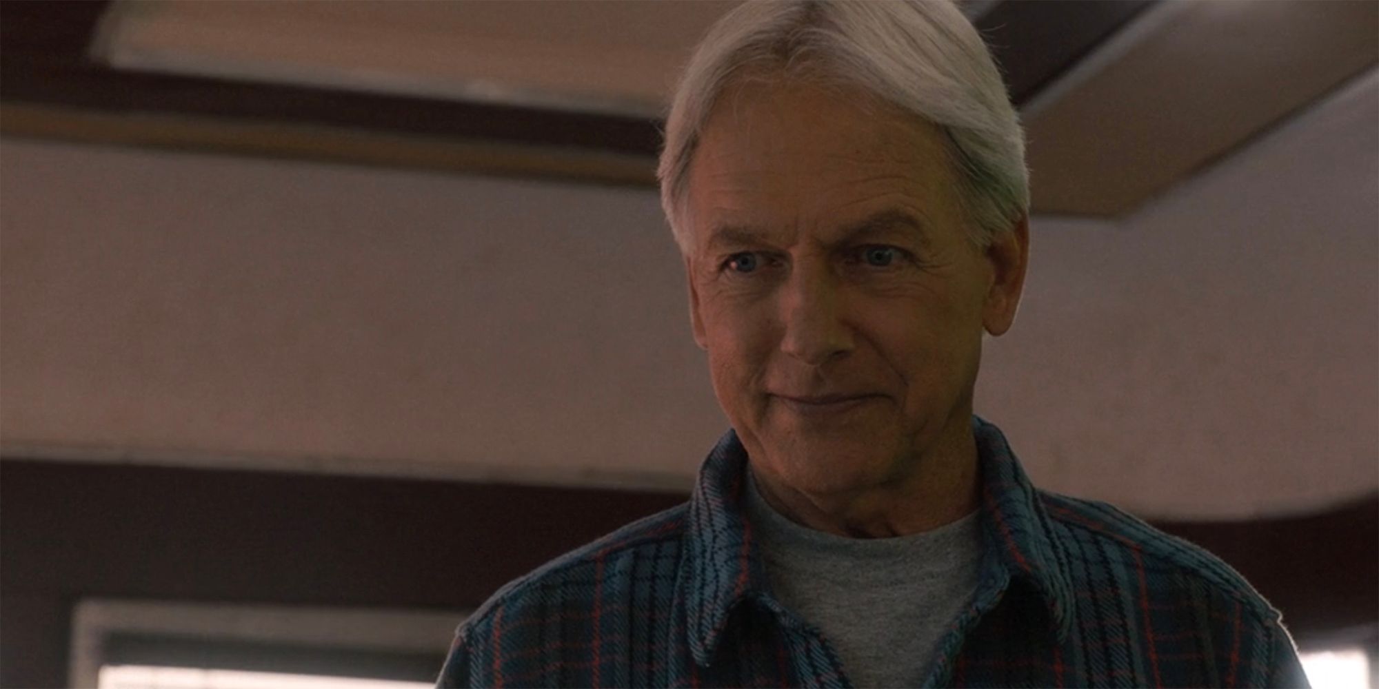 A close up of Gibbs smiling in NCIS