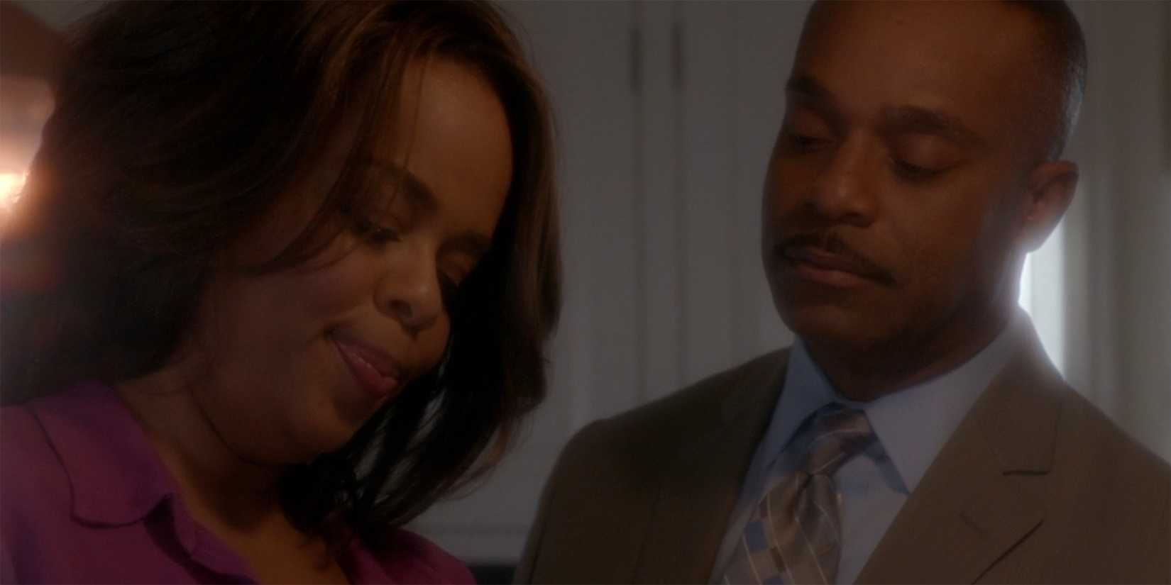 Rocky Carroll as Leon Vance looking at Paula Newsome as Jackie Vance in NCIS