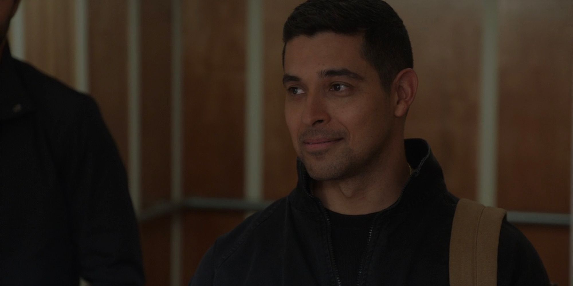 A close up of Nick smiling in NCIS