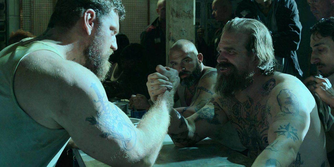 Olivier Richters as Ursa Arm Wrestling with David Harbour as Red Guardian in Black Widow