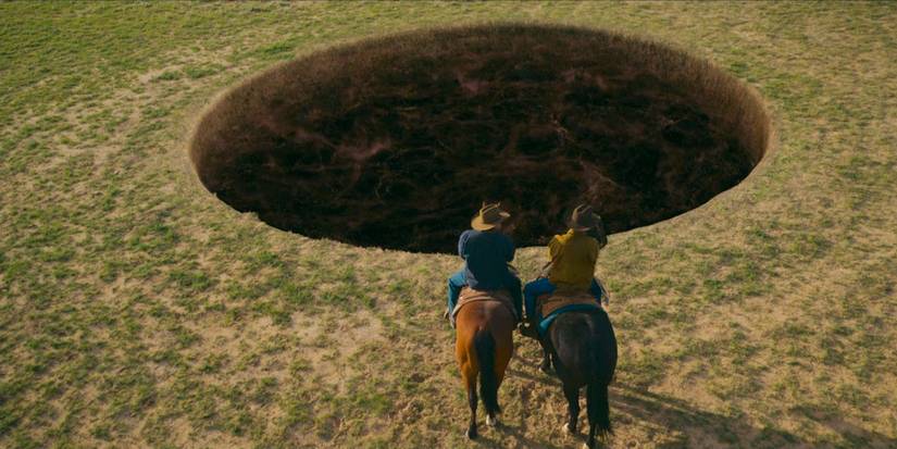 Um buraco misterioso no chão na série Outer Range da Prime Video.