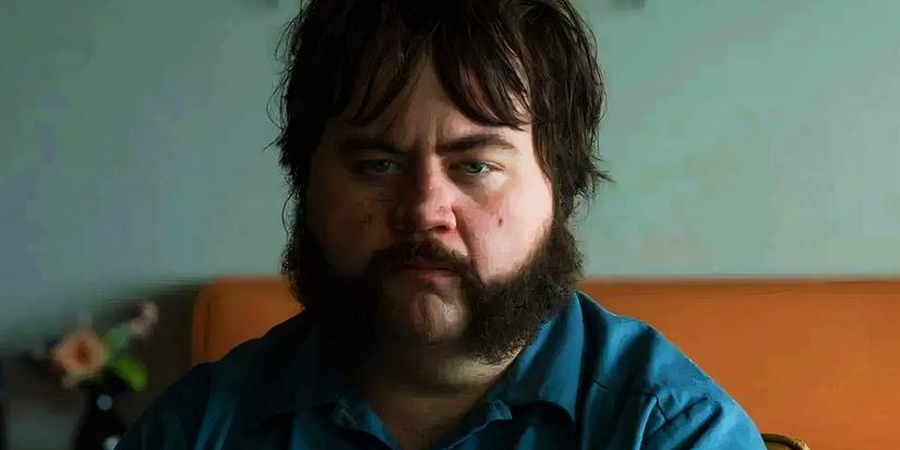 Paul Walter Hauser as Larry Hall looking angry in Black Bird.