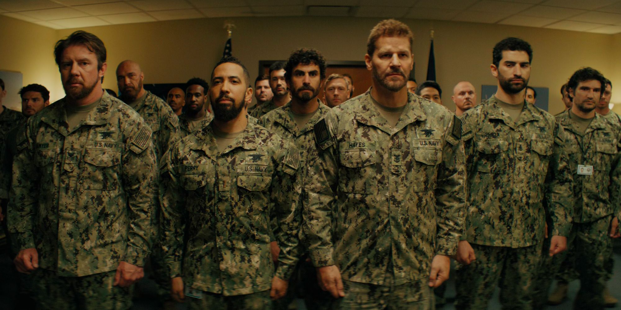 Ray (Neil Brown Jr.) and Jason (David Boreanaz) with their team on SEAL Team Season 6 Episode 10