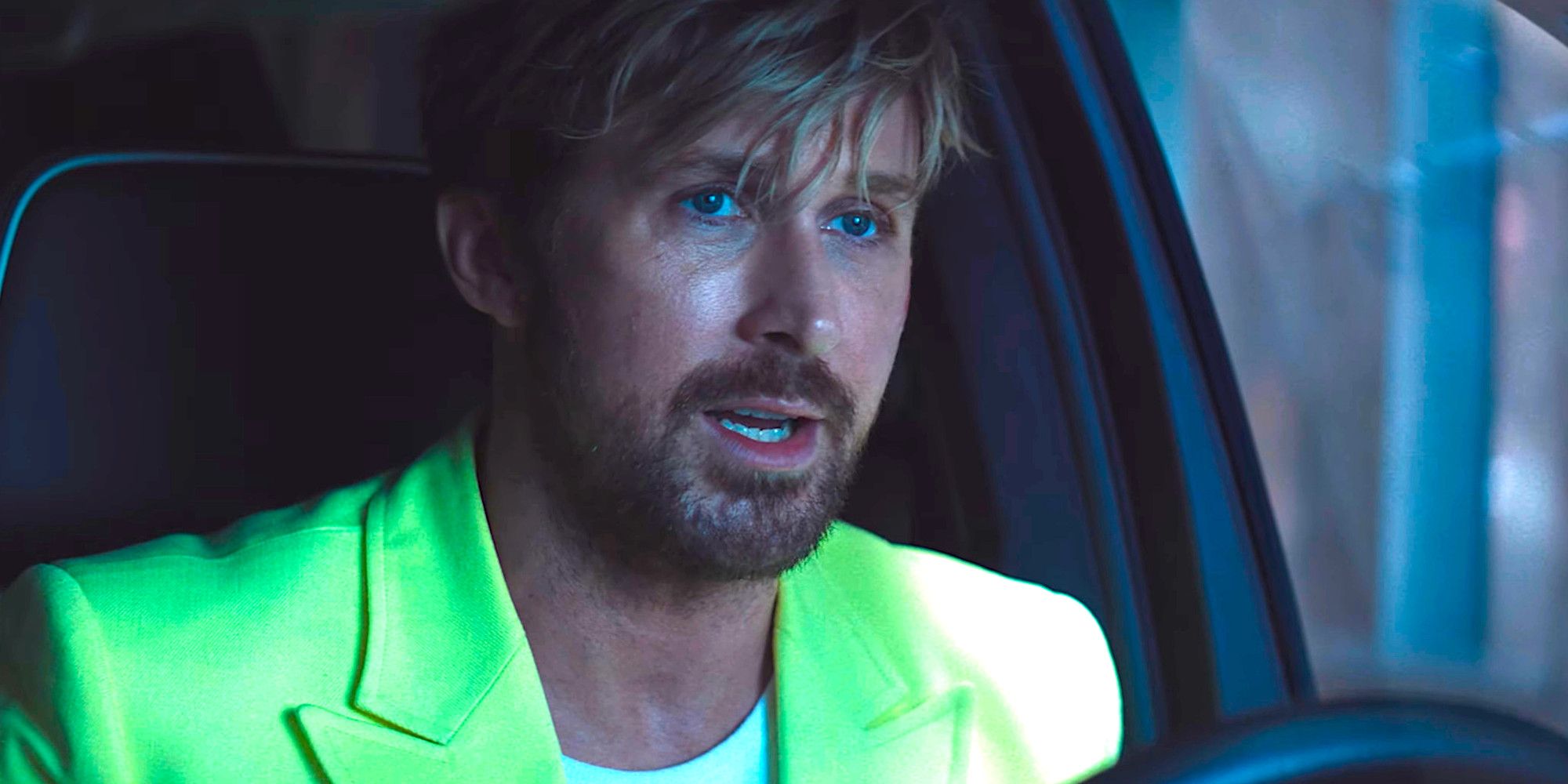 Ryan Gosling sits in a vehicle talking in a scene from The Fall Guy