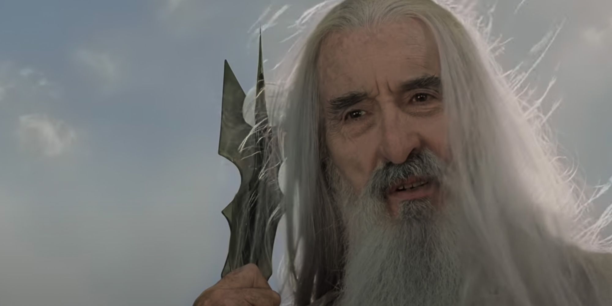 Christopher Lee as Saruman looking down from atop his tower in The Lord of the Rings: The Return of the King.