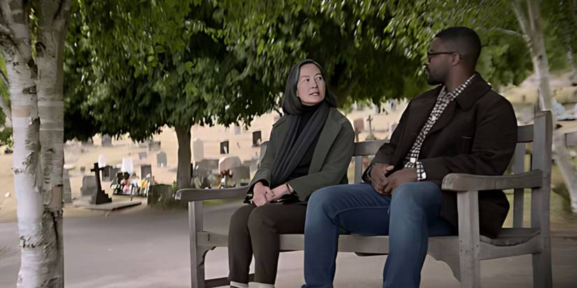 Saul Durand (Jovan Adepo) and Ye Wenjie (Rosalind Chao) speak on a park bench in 3 Body Problem