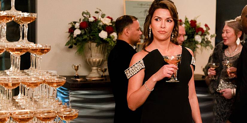 Sofia Pernas as Billie Matalon beside a champagne tower in Tracker
