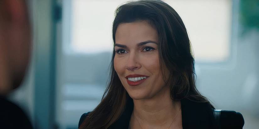 Sofia Pernas as Billie Matalon smiling in front of a window in Tracker