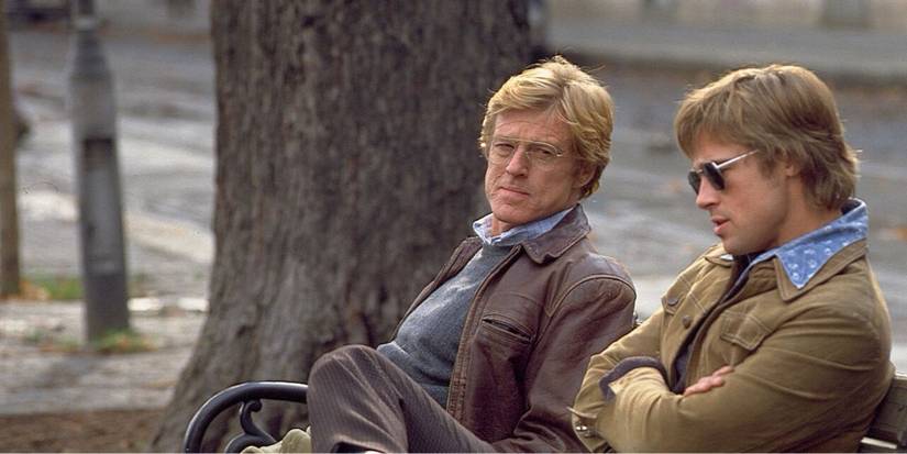 Robert Redford as Nathan Muir talking to Brad Pitt as Tom Bishop in Spy Game