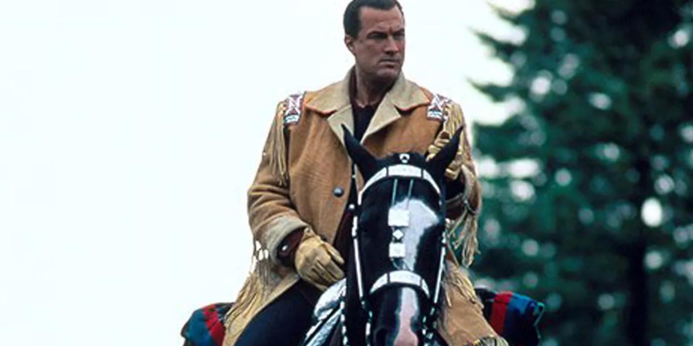 Steven Seagal riding a horse in On Deadly Ground