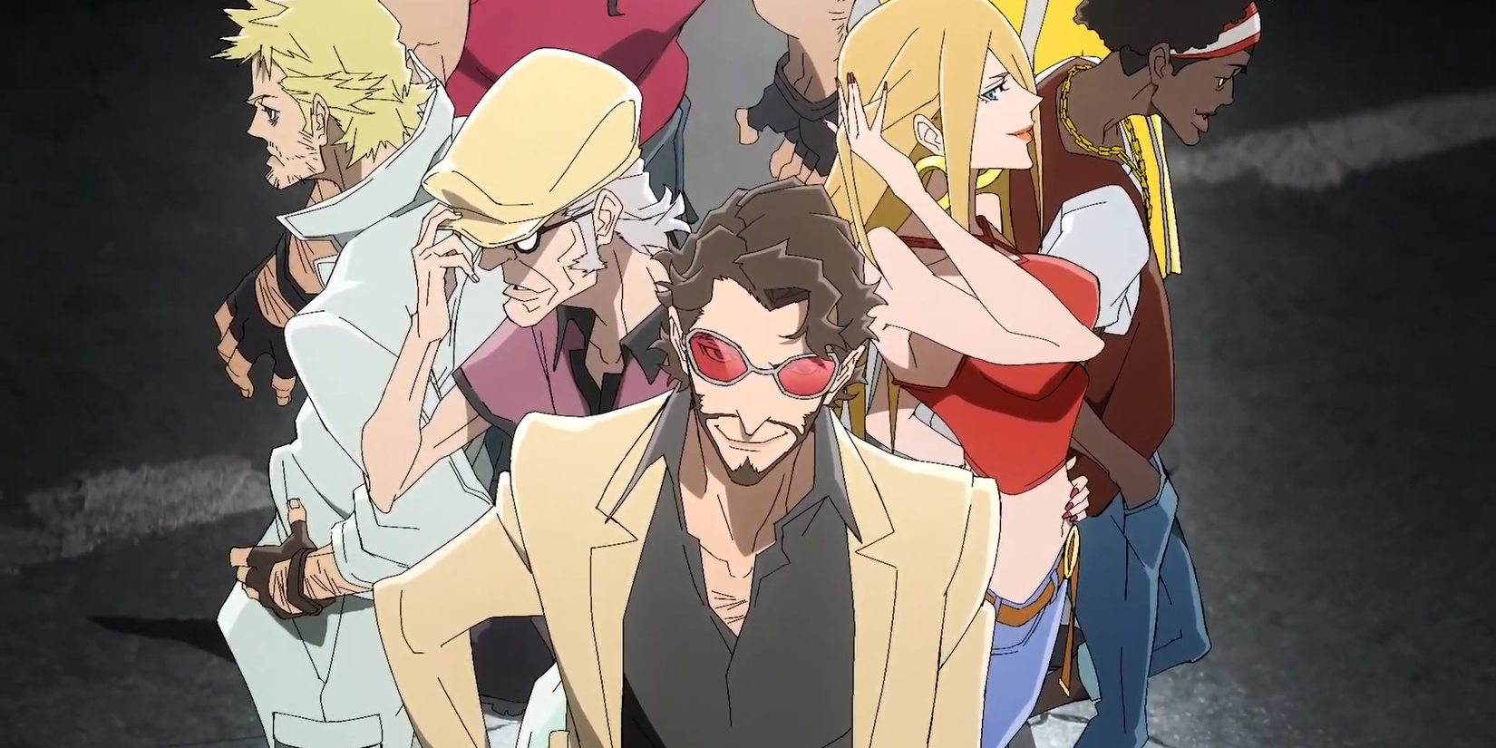 Cropped group shot depicting Johnny Bolt and his team standing in a close circle, seen from above