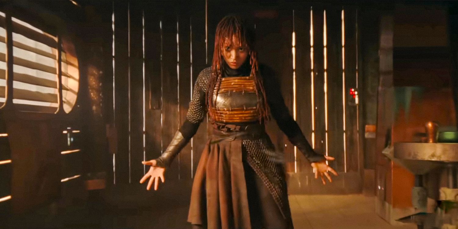 Mae (Amandla Stenberg) in The Acolyte season 1 (STAR WARS) standing with her hands spread out to either side