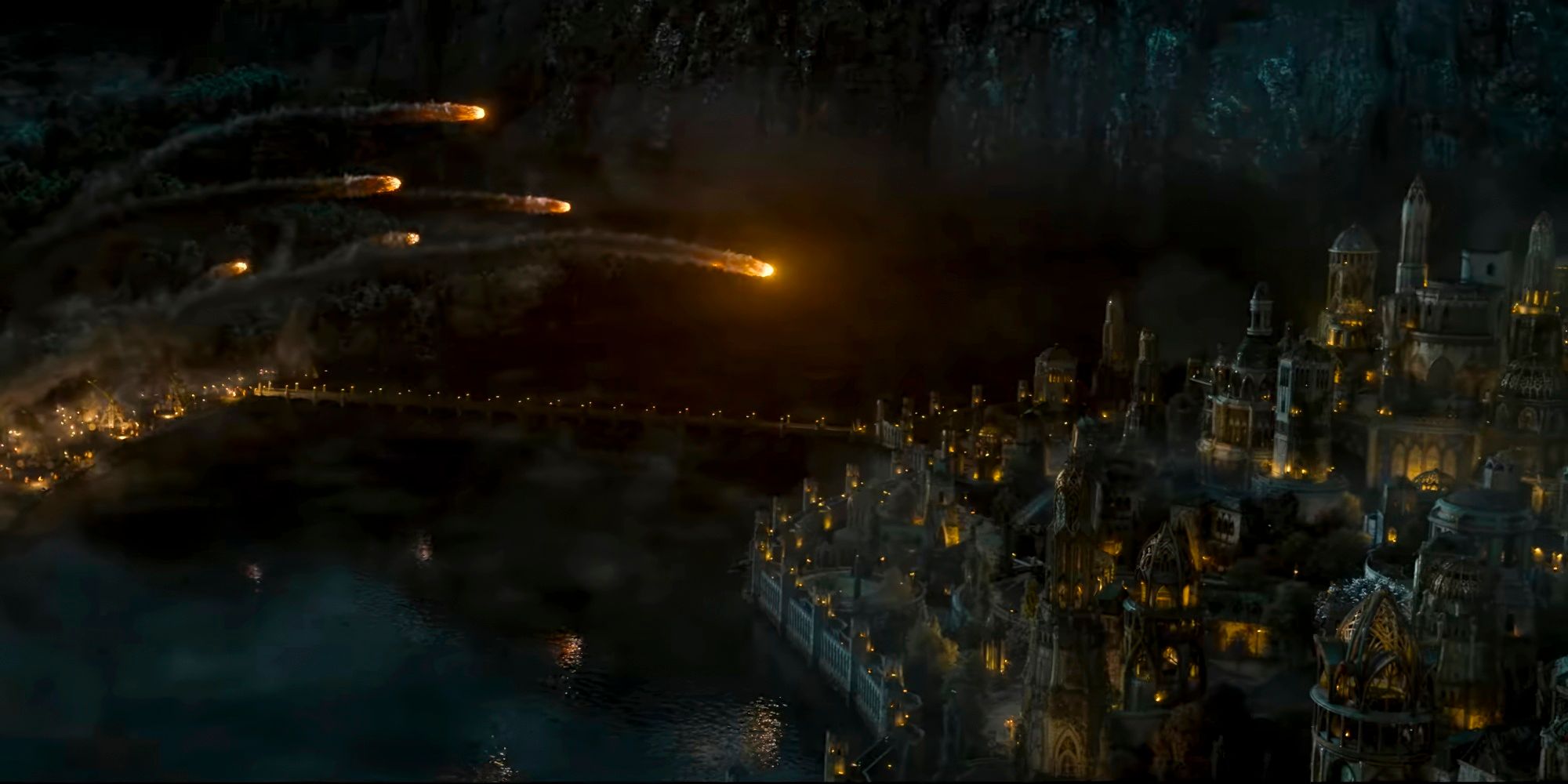 A city is attacked with fireballs during the night in The Lord of the Rings: The Rings of Power season 2