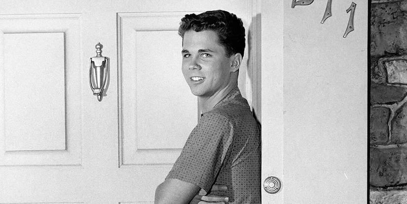Wally standing by a door in Leave It To Beaver