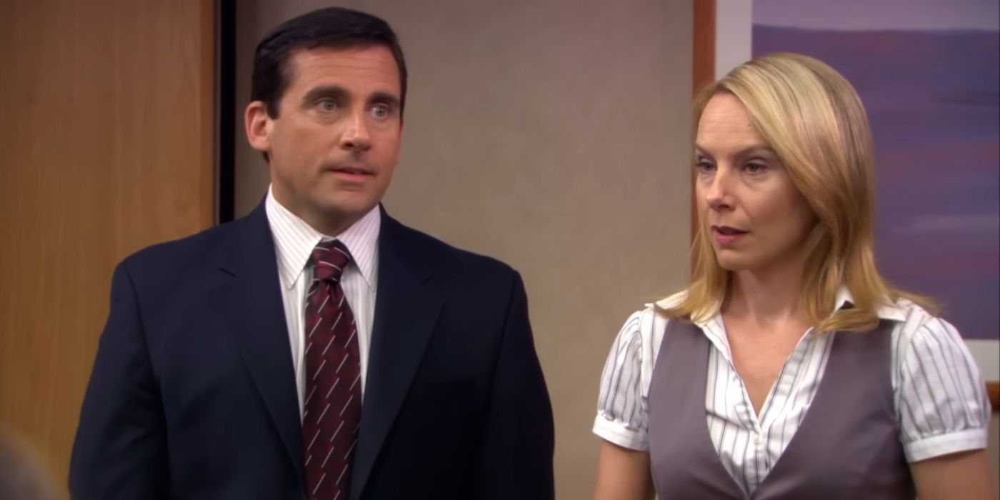 Steve Carell as Michael Scott and Amy Ryan standing at the front of the conference room in The Office episode Business Ethics