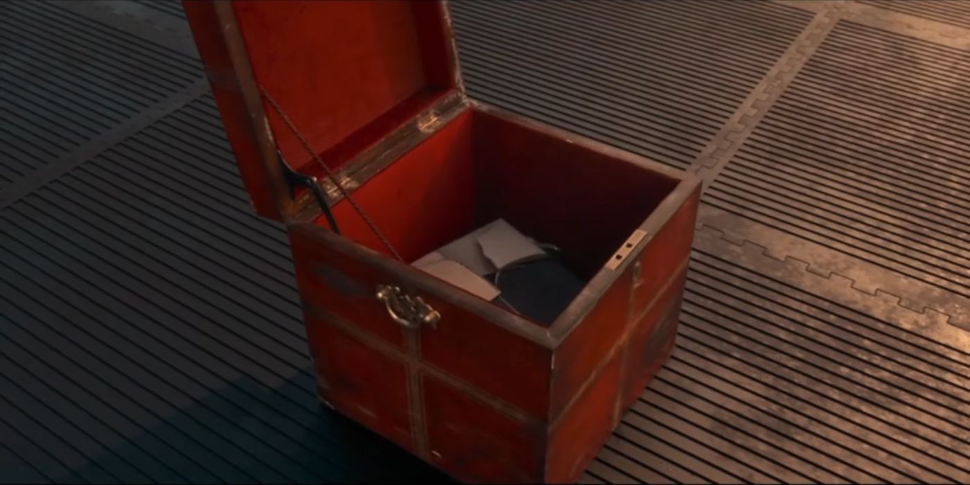 The Toymaker folded up and in his toy box in the Doctor Who episode The Giggle