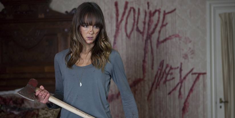 Cena do filme de terror You're Next