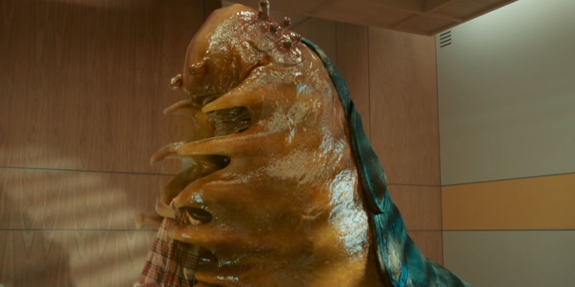 A slug-like alien eating a person in Doctor Who.