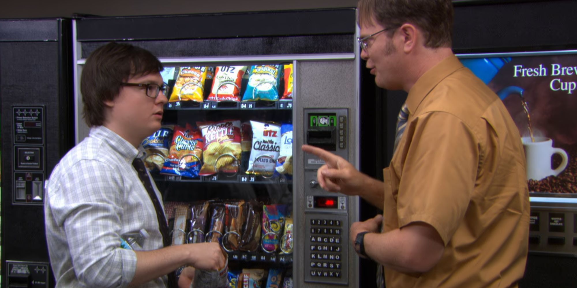 Clark and Dwight talking by the vending machine in The Office