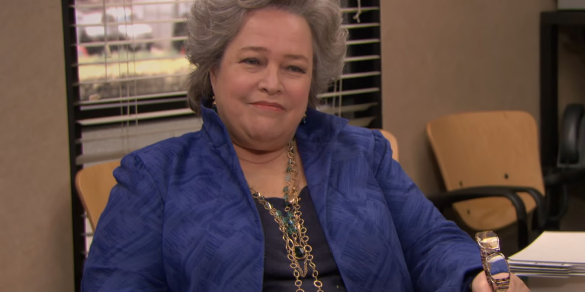 Kathy Bates smiling as Jo Bennett in The Office