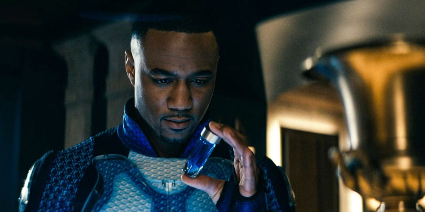 A-Train (Jessie T. Usher) holding a vial of Compound V in The Boys season 4, episode 4