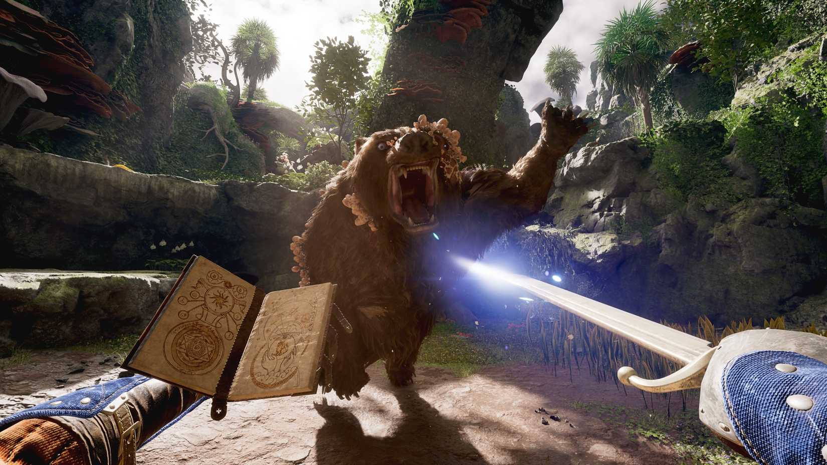 Avowed combat showing the player holding a book and sword while facing a bear that is roaring and swinging its claw.