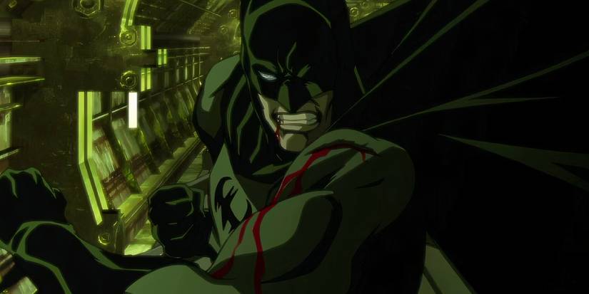 Batman grimaces while bleeding in Batman Gotham Knight