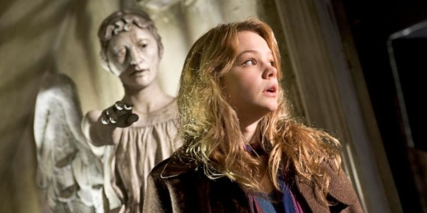 Sally Sparrow with a Weeping Angel behind her in Doctor Who