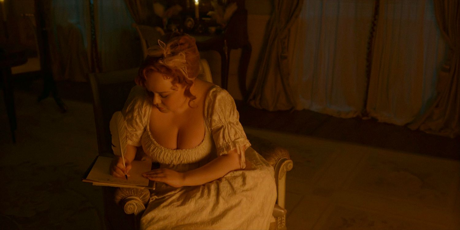 Penelope (Nicola Coughlan) writing a letter by candlelight in Bridgerton season 3 episode 5