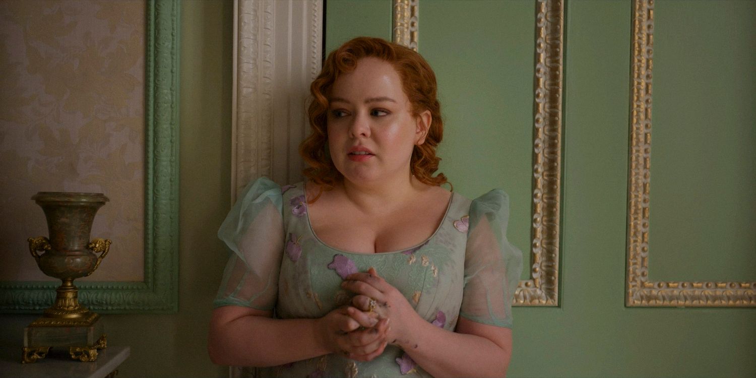 Penelope (Nicola Coughlan) thoughtfully touching her engagement ring in Bridgerton season 3 episode 6