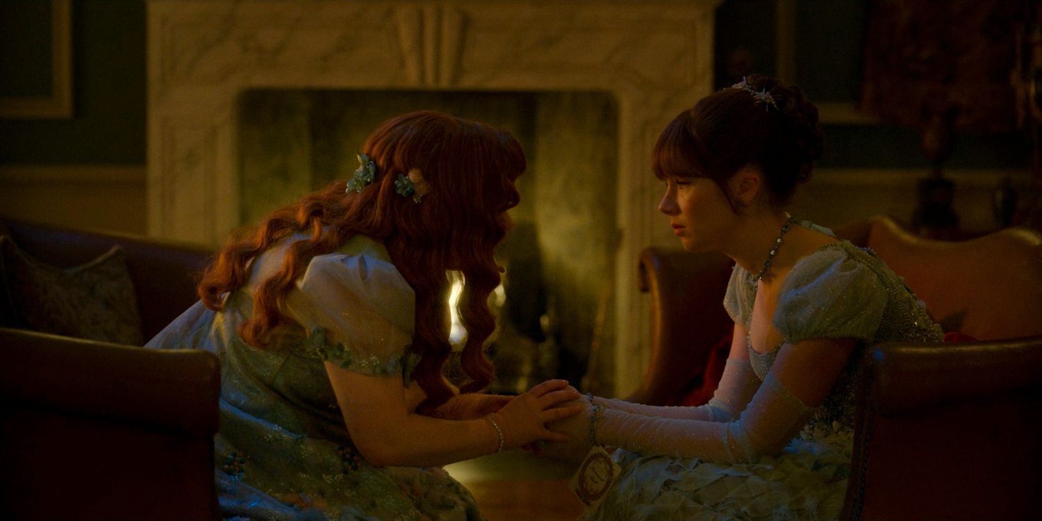 Penelope (Nicola Coughlan) and Eloise Bridgerton (Claudia Jessie) holding hands in complicity in Bridgerton season 3 episode 6
