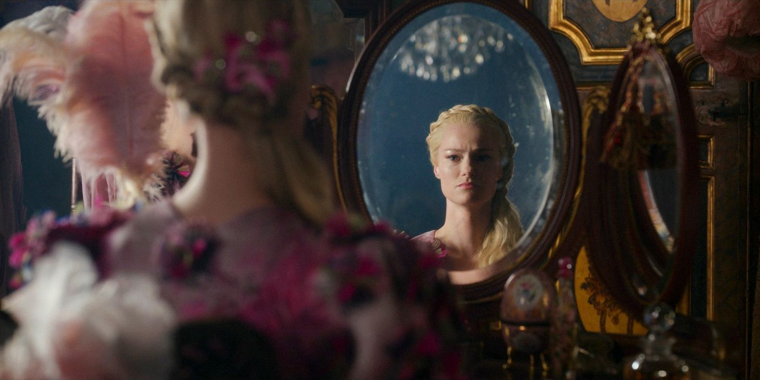 Cressida Cowper (Jessica Madsen) looking furious staring at herself in the mirror in Bridgerton season 3 episode 7