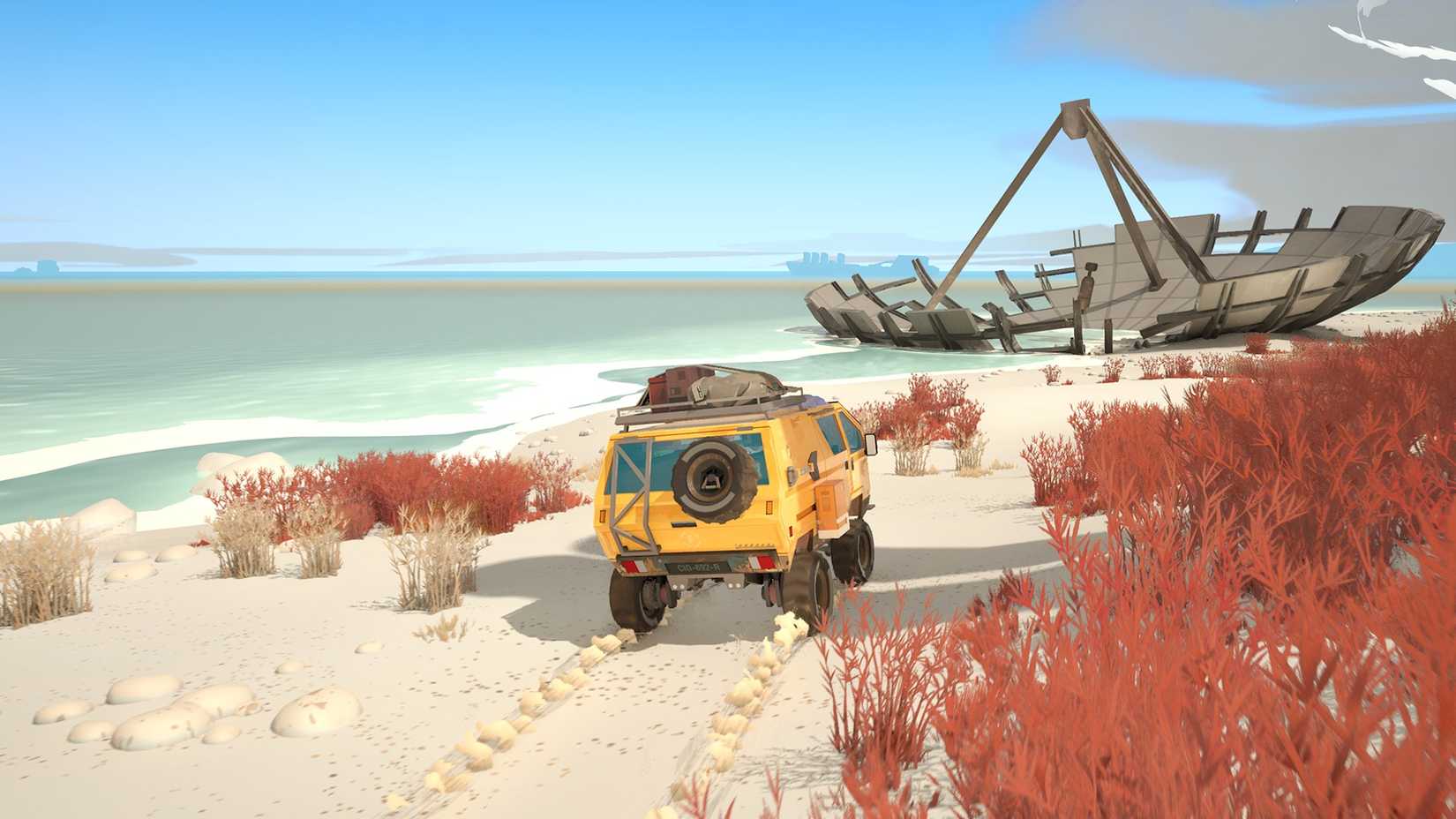 Caravan SandWitch yellow van driving across the sand on a beach, a decaying ship is in the distance.