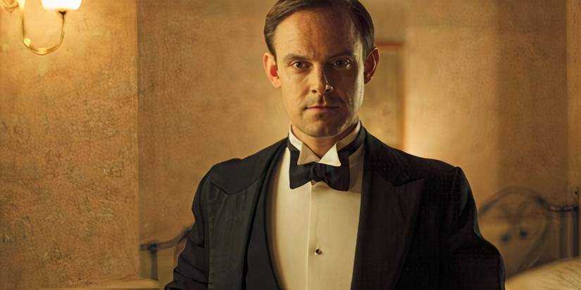 Bertie Hexham looks sternly toward the camera in Downton Abbey