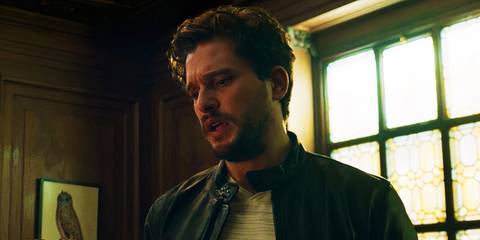 Dane Whitman looking at the Ebony Blade in Eternals