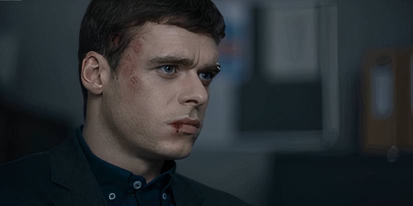 A beaten up David (Richard Madden) staring to the side in Bodyguard