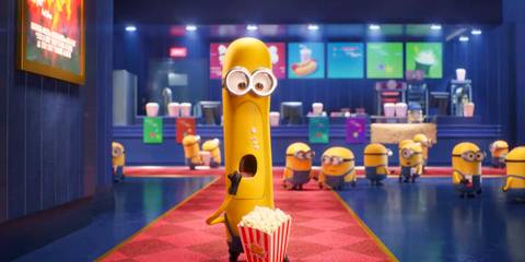 Mega Minion Tim eating popcorn at the cinema in Despicable Me 4