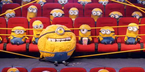 Mega Minion Jerry jumping off the ropes in a cinema hall in Despicable Me 4