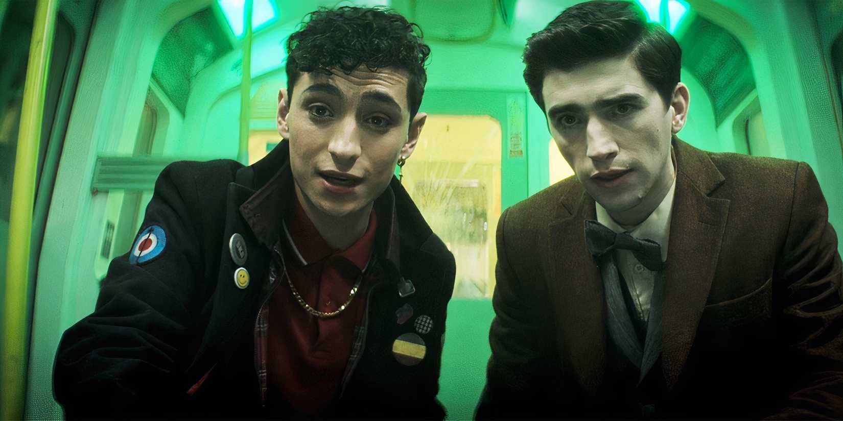 Edwin (George Rexstrew) and Charles (Jayden Revri) staring at something in Dead Boy Detectives season 1, episode 1