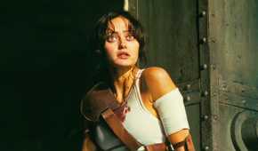 Ella Purnell as Lucy looking concerned in Fallout season 1 wearing a bloodstained shirt