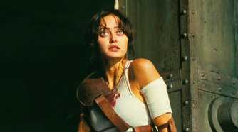 Ella Purnell as Lucy looking concerned in Fallout season 1 wearing a bloodstained shirt