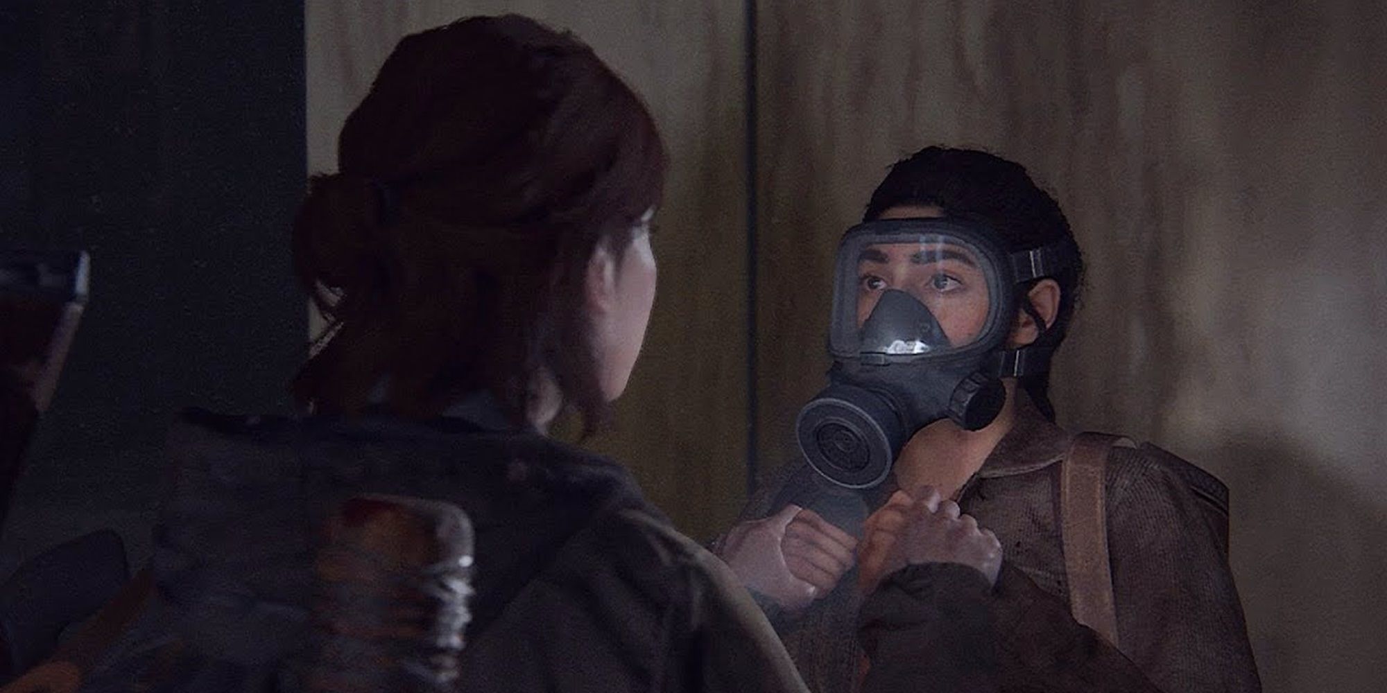 Ellie talks to Dina with a gas mask on in The Last of Us Part II