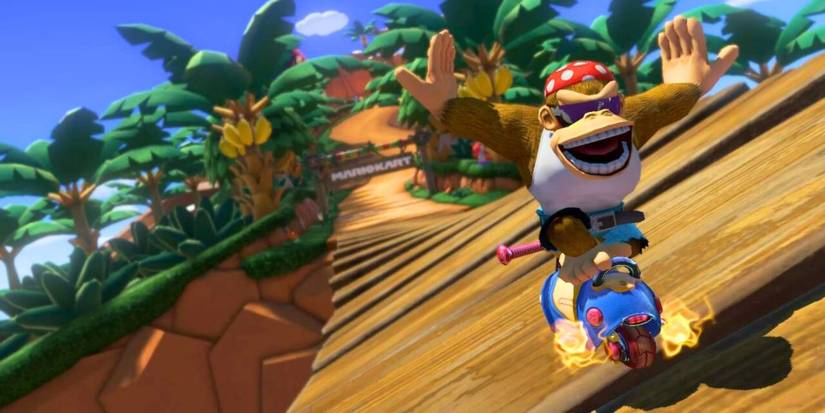 Funky Kong on the DK Mountain bridge in Mario Kart 8 Deluxe.