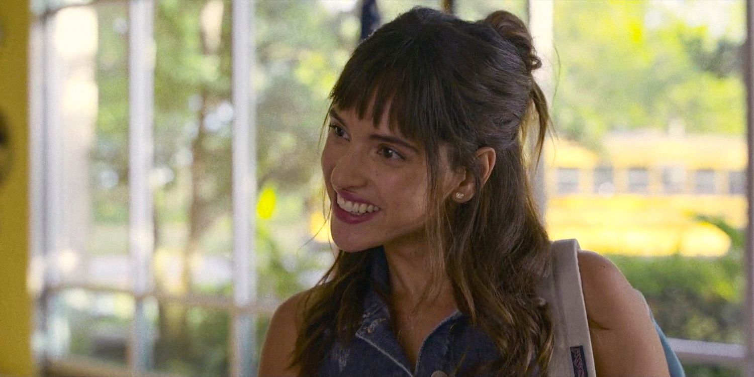 Madison Figueroa (Adria Arjona) smiling in Hit Man (2023)