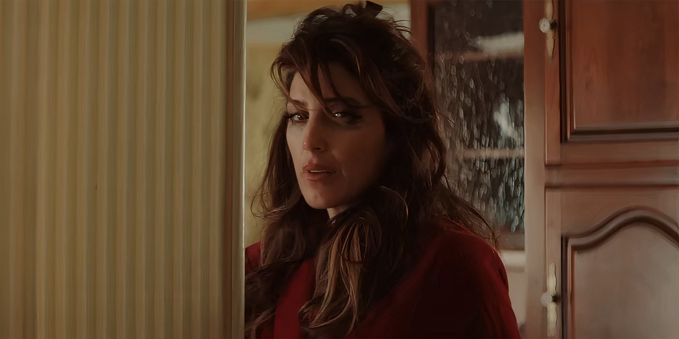 Jennifer Esposito as Francine with tears in her eyes in a doorway in Fresh Kills