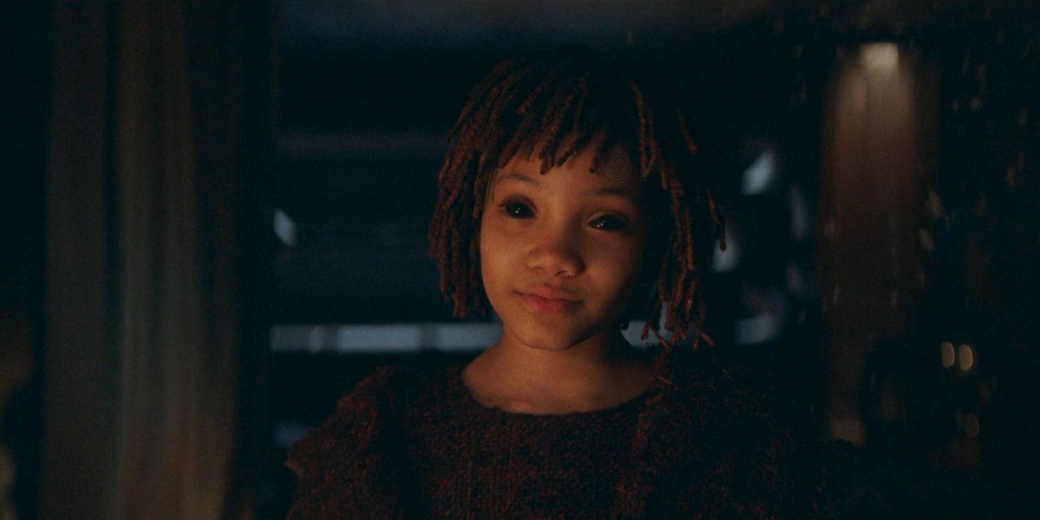 A vision of young Mae Aniseya with black eyes in The Acolyte season 1, episode 1 