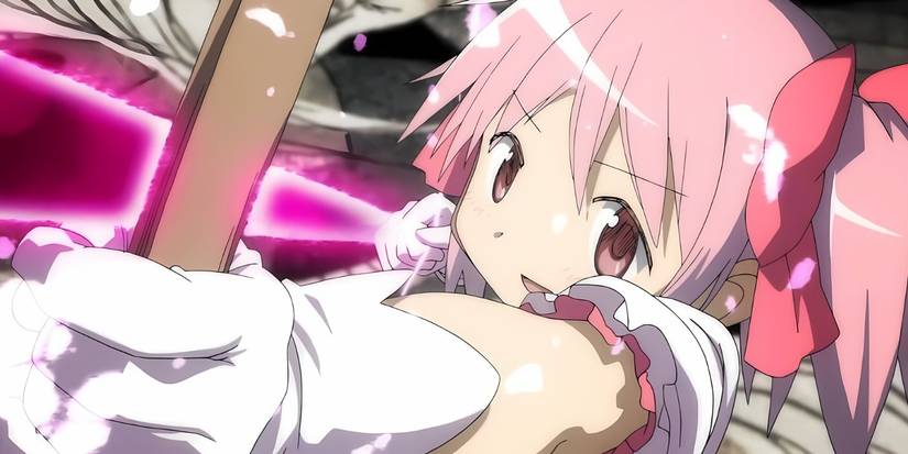 Madoka aiming her bow in the anime