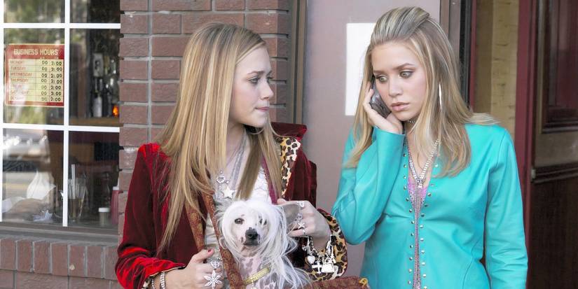 Mary Kate and Ashley Olsen looking worried while on the phone in New York Minute.